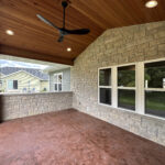 673 Black Earth Rear Covered Porch Stamped Colored Concrete Cedar Wood Ceiling2