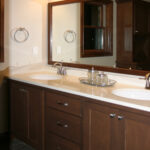 3424 Schubert Master Bathroom Vanity. Quartz Countertops. Ceramic Tile Floors. Stained Maple Cabinetry. Flat Panels.