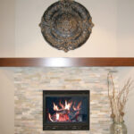 395 Whispering Creek Stacked Stone Fireplace to Mantel Height with Stained Maple Boxed Beam Style Mantel.