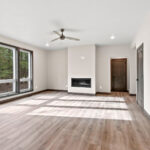 6067 Governors Woods Living Room. Clean Modern Plastered Drywalled Fireplace Surround.