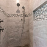 4976 Plum Bottom Rd Owners Tiled Shower. Mosaic Band. Shampoo Niche. Hand Shower.