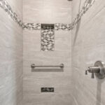 3597 E Hank Owners Tiled Shower. Shampoo Niche. Foot Niche. Grab Bar.