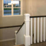 2411 Pristine Stairs. Painted Wood Boxed Newel Posts & Balusters with Stained Handrail.