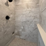 10510 Sugar Creek Tiled Shower. Walk-In Tiled Shower with Shampoo Ledge Wall and Foot Niche.