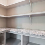 9185 Rasner Walk-In Pantry. Alpine White Granite Countertops. Shiitake SW9173.
