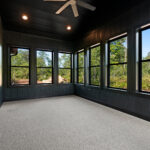 9185 Rasner Three Seasons Room. Black windows. DiamondKote Onyx black vertical grooved wall panels.