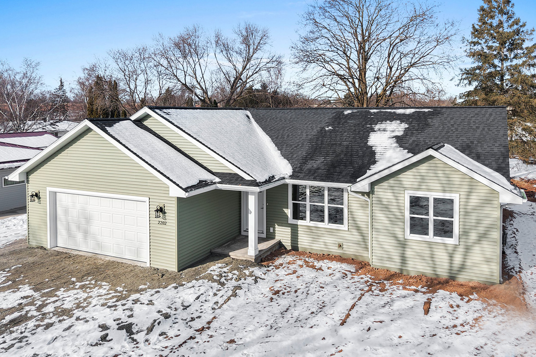 2202 Patty Ln Exterior. Certainteed Monogram "Cypress" Siding with "Moire Black" shingles.