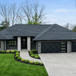 3409 Schubert Exterior. Black Windows. DiamondKote Terra Bronze LP SmartSide Siding. Black Soffit. MSI "Iceland Gray" Natural Thin Stone Veneer.