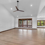 3409 Schubert Great Room. Kentmore Lodge "Natural Canvas Oak" Vinyl Plank Flooring. Cathedral Ceiling.