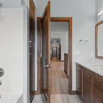 3409 Schubert Main Bathroom. Calacatta Laza Quartz Countertops.