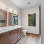 3409 Schubert Owners Bathroom. Ship Rock Quartz Countertops. Adura Flex "Sea Mist" Vinyl Tile Flooring.