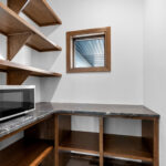 3409 Schubert Pantry. Via Lectera Leathered Granite Countertops.