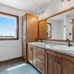 7120 Morrison Rd Owners Bathroom. Stained Maple Cabinets. Adura Flex "Carbon" Vinyl Tile Flooring.